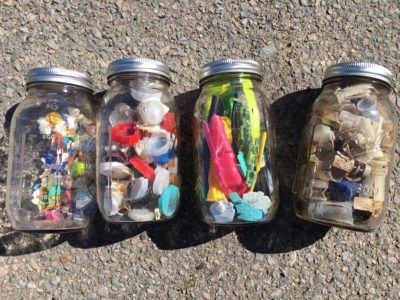 Marine debris in glass jars