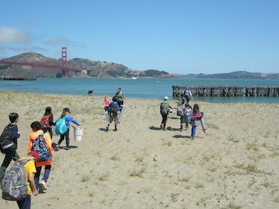Kids exploring the sandy beach