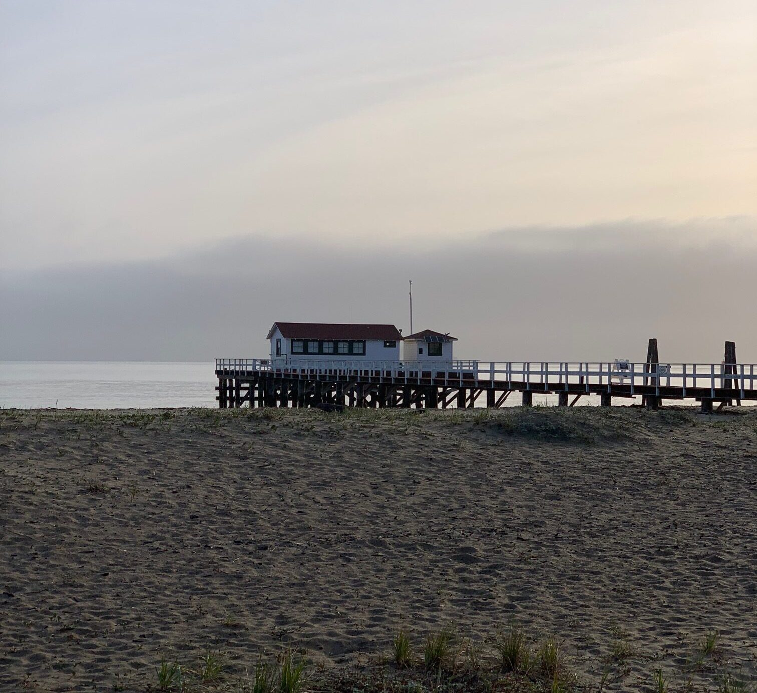 GFNMS Pier House at sunrise. Fog bank seen in background.