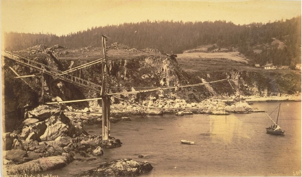 Dog hole port seen from offshore, photograph is very old with sepia toned aesthetic 